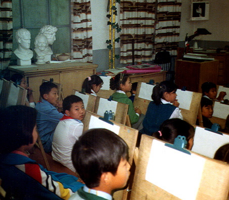 BEIJING: An art class just beginning a lesson. Busts of Julius Caesar and Voltaire in the background on the left.