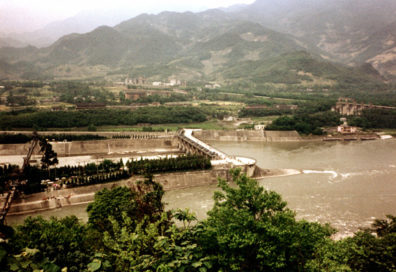 CHENG DU: The waterworks consist of a carefully engineered barrier in mid-stream at a fork in the river which diverts most of the water toward agricultural areas in times of low flow, but keeps excess water from flooding the fields in periods of high flow. The Russians built a modern dam to replace it, which turned out to not work as well, and has been abandoned.