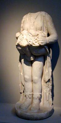 SELÇUK MUSEUM: Then there's the phallic agricultural god Priapus who adorned many gardens with his enormous organ inspiring the crops the grow, symbolized here by the harvest bounty balanced on top of the organ that acted as marble fertilizer.