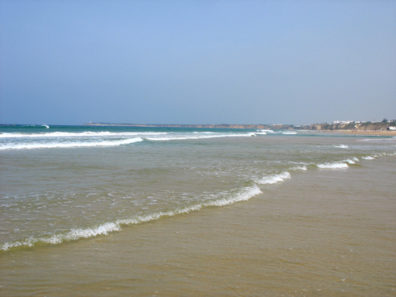 CONIL: The shore slopes gradually here, which means breakers you can wade into, and warm water.