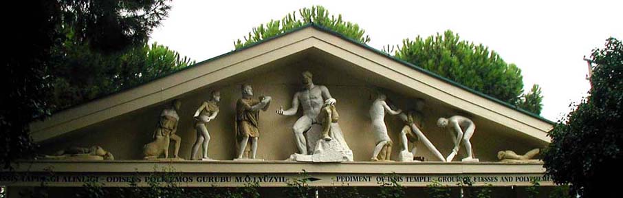 SELÇUK MUSEUM: The museum has guessed from the few remaining fragments at the design of an unforgettable scene from the Odyssey in this reconstruction: Odysseus offering the Cyclops Polyphemus wine while his men sharpen a stake at the right which they will poke in his eye after he's asleep. The original fragments (represented here by the portions in white) are exhibited separately, and don't make much of an impression until you understand the overall design.