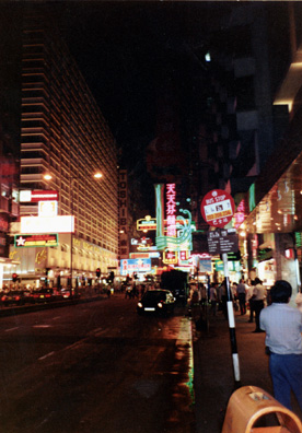 HONG KONG: Terry Cook and I, rooming together at the Empress Hotel, spent a few hours walking around warm and humid nighttime Hong Kong, constantly solicited by vendors who murmured: "Copy watch?" We saw lots of high-fidelity equipment, cameras, many jewelry stores. Big neon signs hung out practically across the streets.
