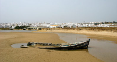 CONIL: For splendid isolation, head south across the bridge from Conil to Playa Fuente del Gallo where an old rowboat lies stranded in the sands.