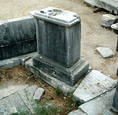 PRIENE: It's a clepsydra, or water clock, used to regular public debates. When the dripping water ran out the channel on the left and down the pillar, your speaking time was up. Don't ask how the water got in; that's all the guide told us.