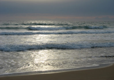CONIL: At the end of the day, the sea was transformed, seeming to be illuminated by moonlight, though it was still the sun which was shining through thin clouds.