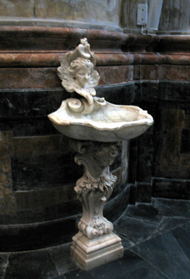 CADIZ: An ornate baroque holy water font.