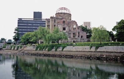 HIROSHIMA: This commercial exposition hall was the only reinforced concrete structure at ground zero, and was left standing after the dropping of the atomic bomb. It has become a symbol of the bombing, and has actually been "restored" to keep it in the precise state of ruin it was in 1945. Just to the right of the dome is visible a bank of lights for the adjacent baseball stadium. Hiroshima is a very modern city. May 17, 1998