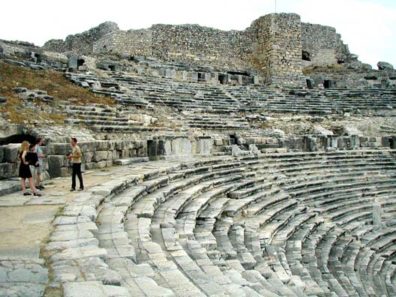 MILETUS: This photographer was busy snapping shots of his models in cocktail dresses among the theater seats.