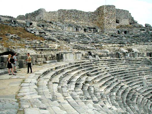 MILETUS: This photographer was busy snapping shots of his models in cocktail dresses among the theater seats.