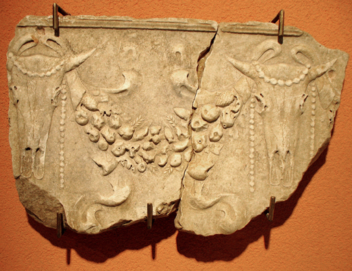 CADIZ: Roman relief with cow skulls and garland of fruit. In the Museum of Fine Art and Archaeology, Cadiz.