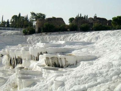 PAMUKKALE: The cliff near the top, showing part of the Roman ruins of Hieropolis above.