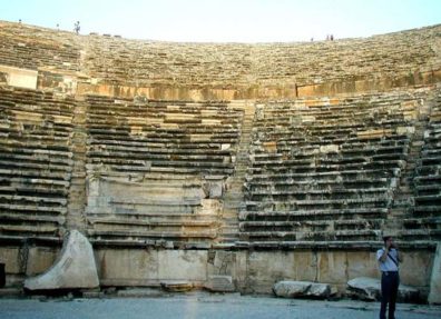 HIEROPOLIS: To get some idea of how vast this theater is, look at the tiny figures standing on the rim at the top. It might have held as many as 12,000 spectators when Hieropolis was a thriving city.