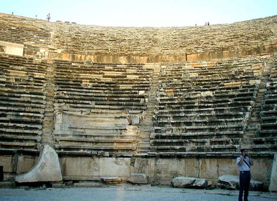 HIEROPOLIS: To get some idea of how vast this theater is, look at the tiny figures standing on the rim at the top. It might have held as many as 12,000 spectators when Hieropolis was a thriving city.