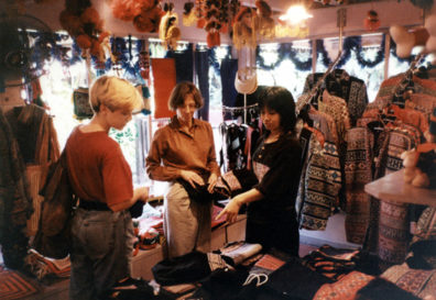 Paula (right) and Megan (left) bought elegant outfits in this Hmong shop for a fraction of what it would have cost at home. Nearby Megan and I also bought identical Tintin t-shirts.
