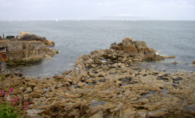 SANDYCOVE: Looking out to sea, Joyce would have seen these rocks adjacent to the natural "Forty Foot Pool" where the characters in his novel go swimming, and which is still a swimming spot today.