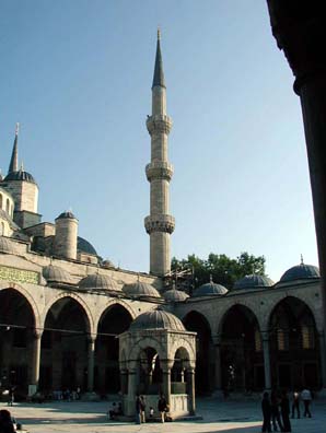 BLUE MASQUE: Another view of the fountain in the courtyard, with one of the six minarets in the background.
