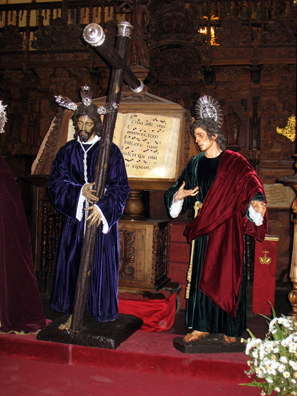 RONDA: Christ with saint in front of musical score, inside Santa María la Mayor.