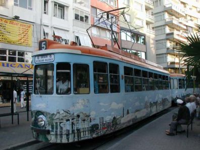 ANTALYA: The Antalya trolleys are covered with depictions of tourist spots. Recognize the gate from Afrodisias on the front of this one?