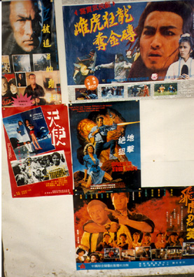 CHENG DU: Movie ads. Lots of violent macho thrillers. Schwarzenegger and Stallone were very popular here.