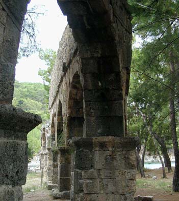 PHASELIS: The most spectacular sight in Phaselis is the last leg of the aqueduct which supplied the city.