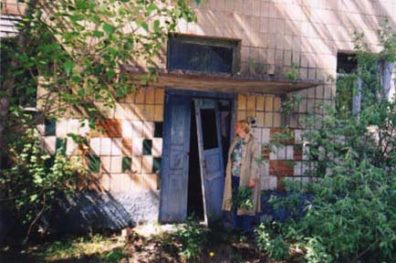 At the entrance to our apartment house.