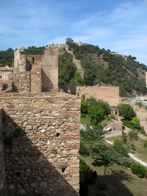 MALAGE: We didn’t climb up the hill to the Castillo beyond, but here’s the view in that direction from the Alcazaba.