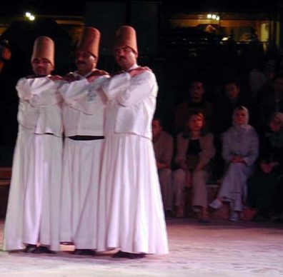 KONYA: At a certain point the dervishes gather in small groups and lean together, reconnecting with each other, before going on to another round of whirling.