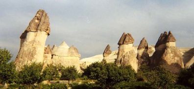 CAPADOCCIA: The rather phallic-looking "fairy castles" near Göreme were formed when the layer of molten lava which solidified on top of the tufa eroded at a slower rate than the underlying ash deposits.