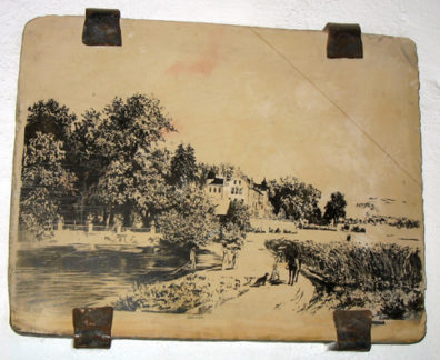 MALAGE: Another decorative printing block, depicting a country scene. In Museo de artes y costumbres populares, Mlaga.