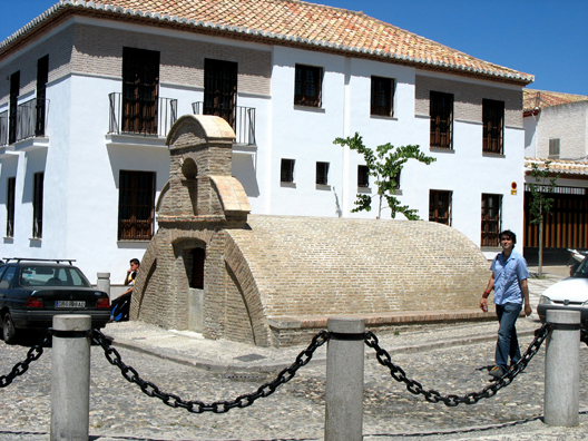 GRANADA: An ancient Moorish cistern in the Square of San Nicolás.