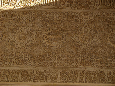 ALHAMBRA: In the midst of all the pious Arabic calligraphy is a single Catholic boast: Tato Mota (“the whole world”).