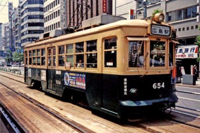 HIROSHIMA: One of Hiroshima's many variegated trolleys. It is said that the reason they have so many different models in different colors is that they bought them second-hand from other cities after the war. May 19, 1998