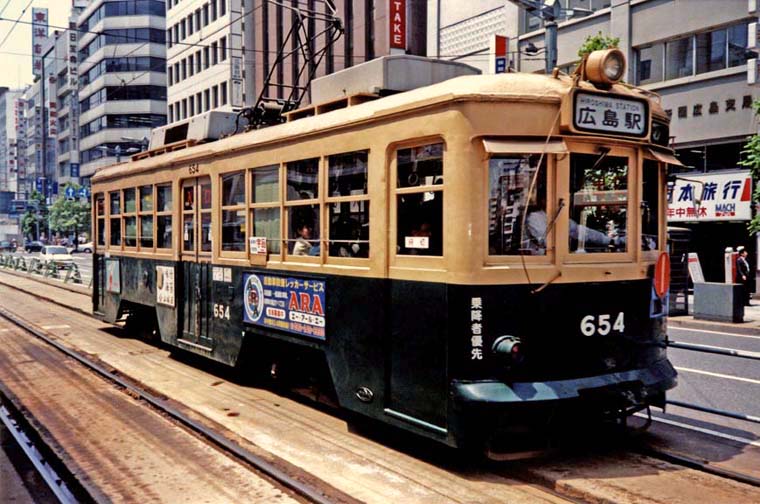 HIROSHIMA: One of Hiroshima's many variegated trolleys. It is said that the reason they have so many different models in different colors is that they bought them second-hand from other cities after the war. May 19, 1998