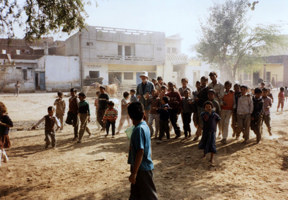 David Thorndike, traveling with the WSU faculty team, charmed the children of this village just outside of Delhi by handing out ballpoint pens as gifts and asking them to sign their name in his notebook.