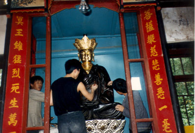 BUDDHIST MONASTERIES: In one quite lovely Buddhist nunnery we saw statues being gilded.