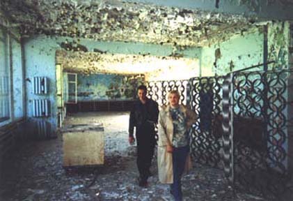 In the same cafe (near our apartment house). Behind me walks Sasha's friend Maksim. It was he who drove us to Pripyat in his car. 