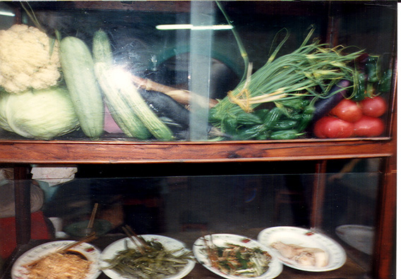 LESHAN: Food on display at a streetside restaurant.