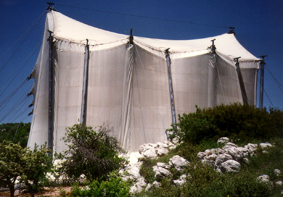 BASSAE: The Temple of Apollo at Bassae is one of the most isolated temples in Greece. Earthquakes and erosion so badly damaged the temple that it had to be enclosed in a tent to keep it from being literally blown over by the hilltop winds while restorers raced to patch it together before it collapsed entirely.