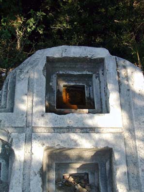 TROY: Carved coffer ornaments, the top one stained with water and a leaf, from the ruins of the ceiling of the Temple of Athena.