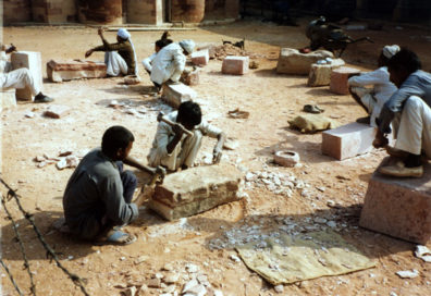 Workers shaping replacement stones to repair the Qutub Minar. The tower was completely rebuilt in the 19th century after it had been destroyed by an earthquake.