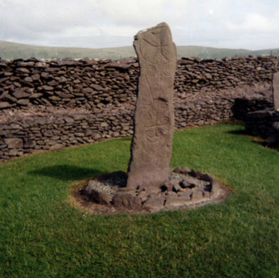 DINGLE PENINSULA: Also at Riasc is this standing stone with Celtic designs on it; note the cross at the top.