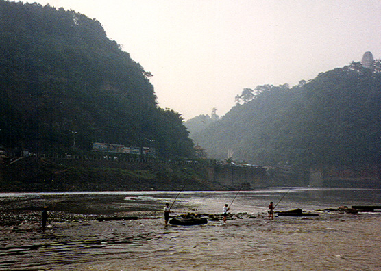 LESHAN: Fishermen in the river near Leshan.