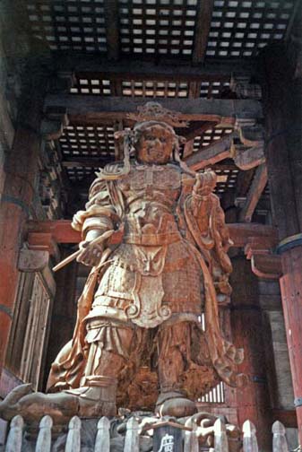 NARA: This guardian spirit holds a writing brush in his right hand. May 21, 1998