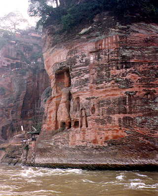 LESHAN: Guardians carved in cliff.