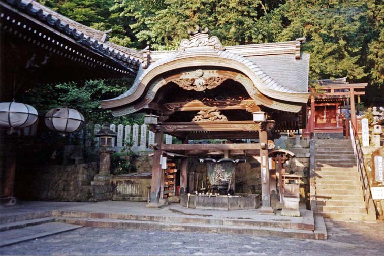 NARA: Part of the Todai-ji Temple complex. This is The temple fountain. In this building, closed to the public, is a famous eleven-faced image of Kannon, Bodhisattva of mercy. The original structure was built in 752, but the present building dates from 1669, after the original burned. It is the site of an annual very popular water festival: Omizu-tori. May 21, 1998