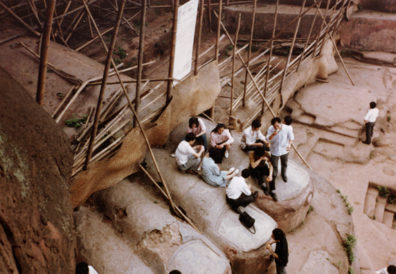LESHAN: Tourists having lunch on the Buddha's toes.