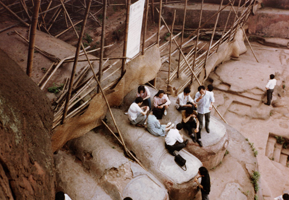 LESHAN: Tourists having lunch on the Buddha's toes.
