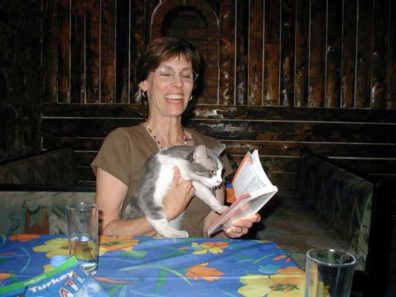 BERGAMA: The restaurant cat looking up the appropriate greeting in Paula's Turkish phrase book.