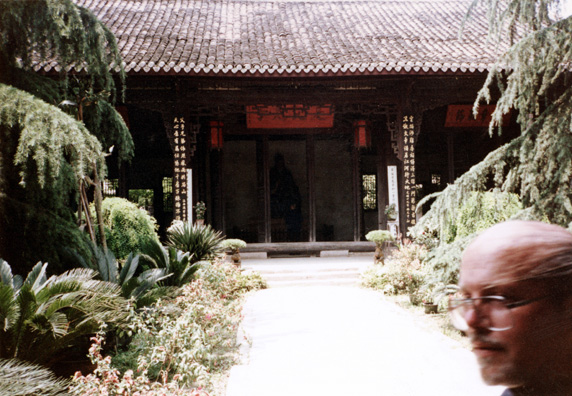 THREE SUS: Temple of the Three Sus near Meishan: shrine to three famous ancient writers, surrounded by beautiful gardens. We could explore only a fraction of them. Terry walked into this shot.