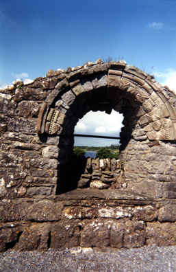 CLONMACNOISE: Arched window from one of the ruined temples at Clonmacnoise.